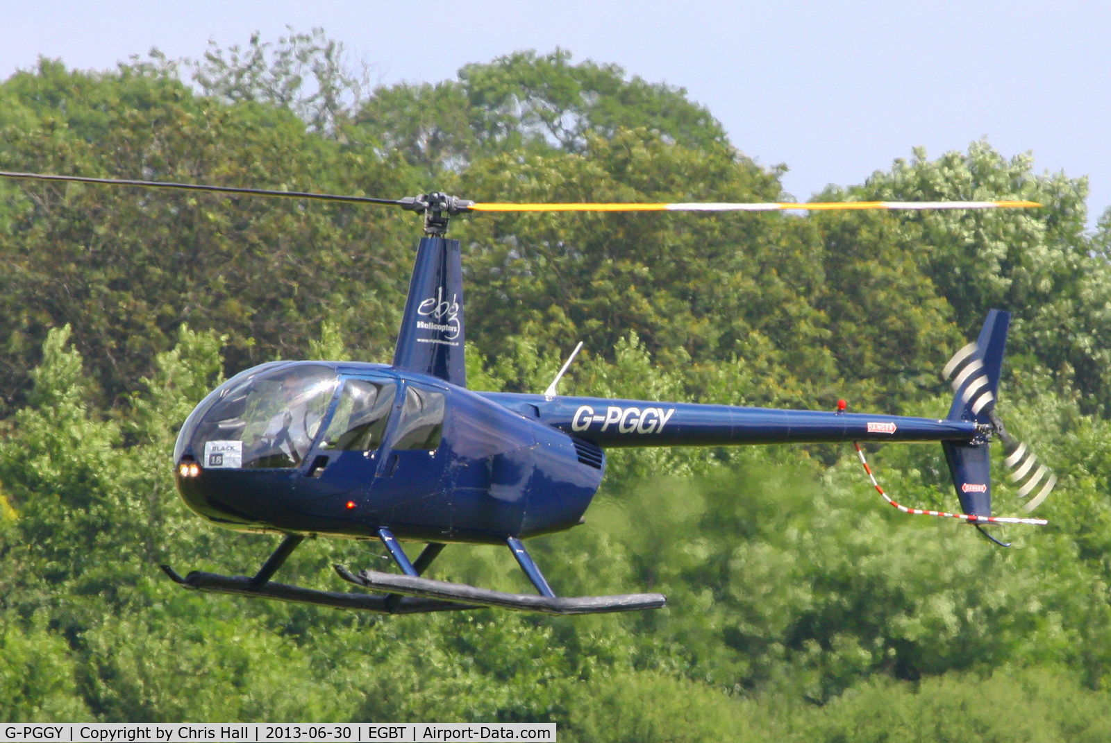 G-PGGY, 2006 Robinson R44 Clipper II C/N 11115, being used for ferrying race fans to the British F1 Grand Prix at Silverstone