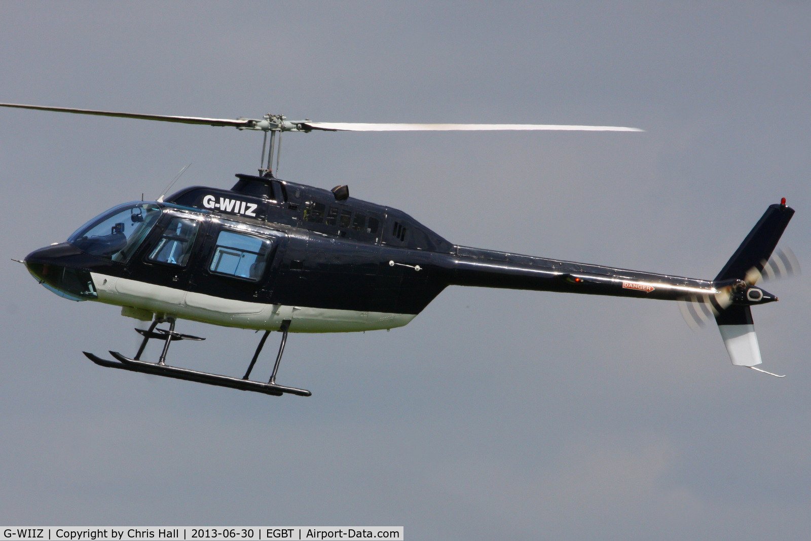 G-WIIZ, 1969 Agusta AB-206B JetRanger II C/N 8111, being used for ferrying race fans to the British F1 Grand Prix at Silverstone