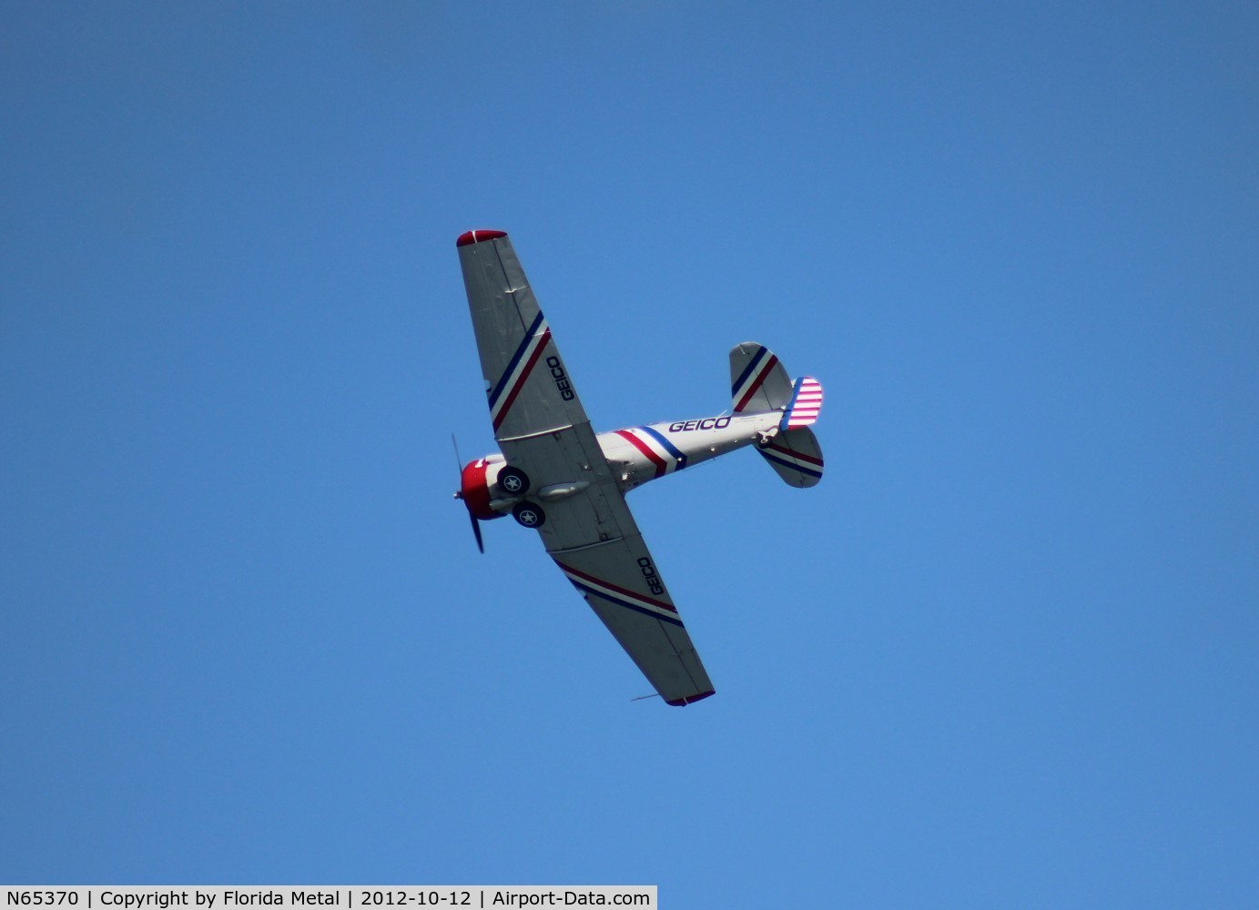 N65370, 1941 North American SNJ-2 Texan C/N 2562, Geico SNJ-2 over Daytona Beach