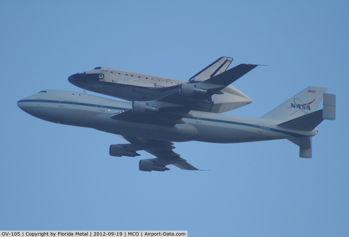 OV-105, 1991 Rockwell International Shuttle C/N 105, Endeavor on back of 747 flying over MCO