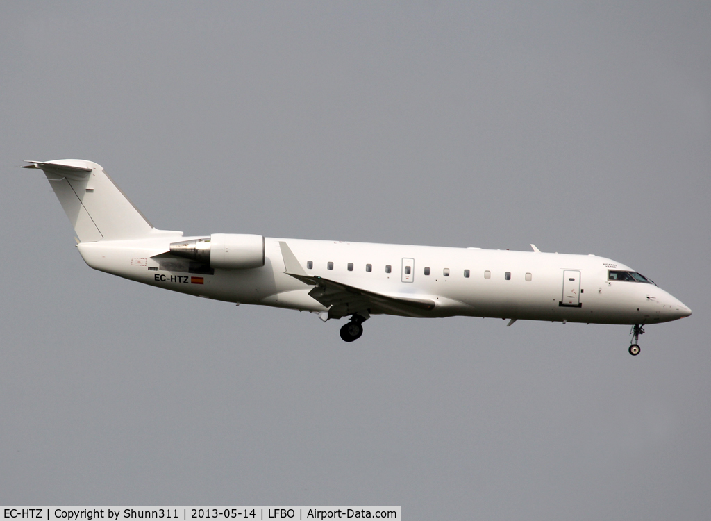 EC-HTZ, 2001 Canadair CRJ-200 (CL-600-2B19) C/N 7493, Landing rwy 14L in all white c/s now...