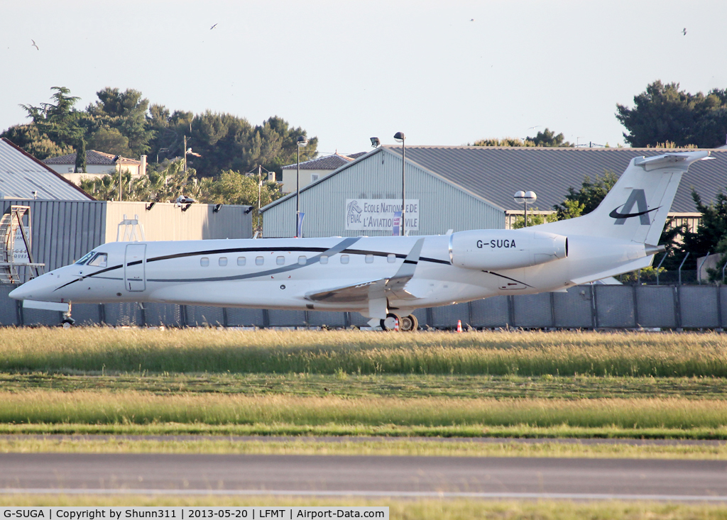 G-SUGA, 2010 Embraer EMB-135BJ Legacy 650 C/N 14501128, Parked at the General Aviation area...