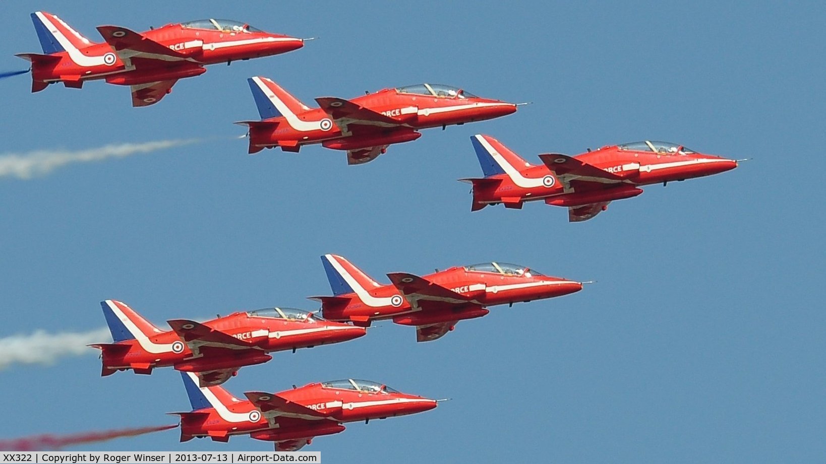 XX322, 1980 Hawker Siddeley Hawk T.1A C/N 165/312147, Off airport. Leading the RAF Red Arrows on the first day of the Wales National Air Show, Swansea Bay, UK. Red 1 is flown by Squadron Leader Jim Turner.