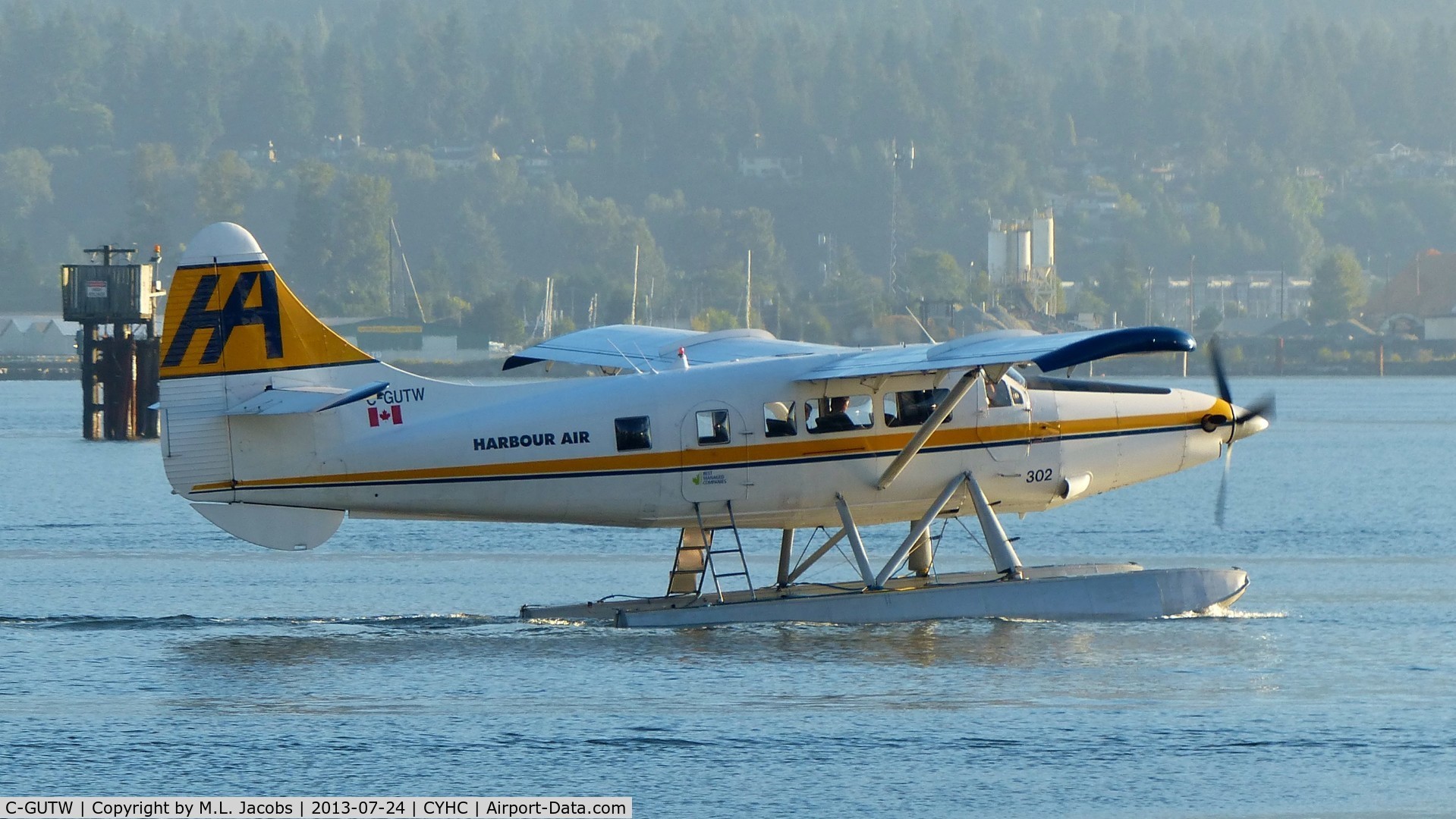 C-GUTW, 1960 De Havilland Canada DHC-3 Turbo Otter Otter C/N 405, Harbour Air #302 with an early morning departure in Coal Harbour.