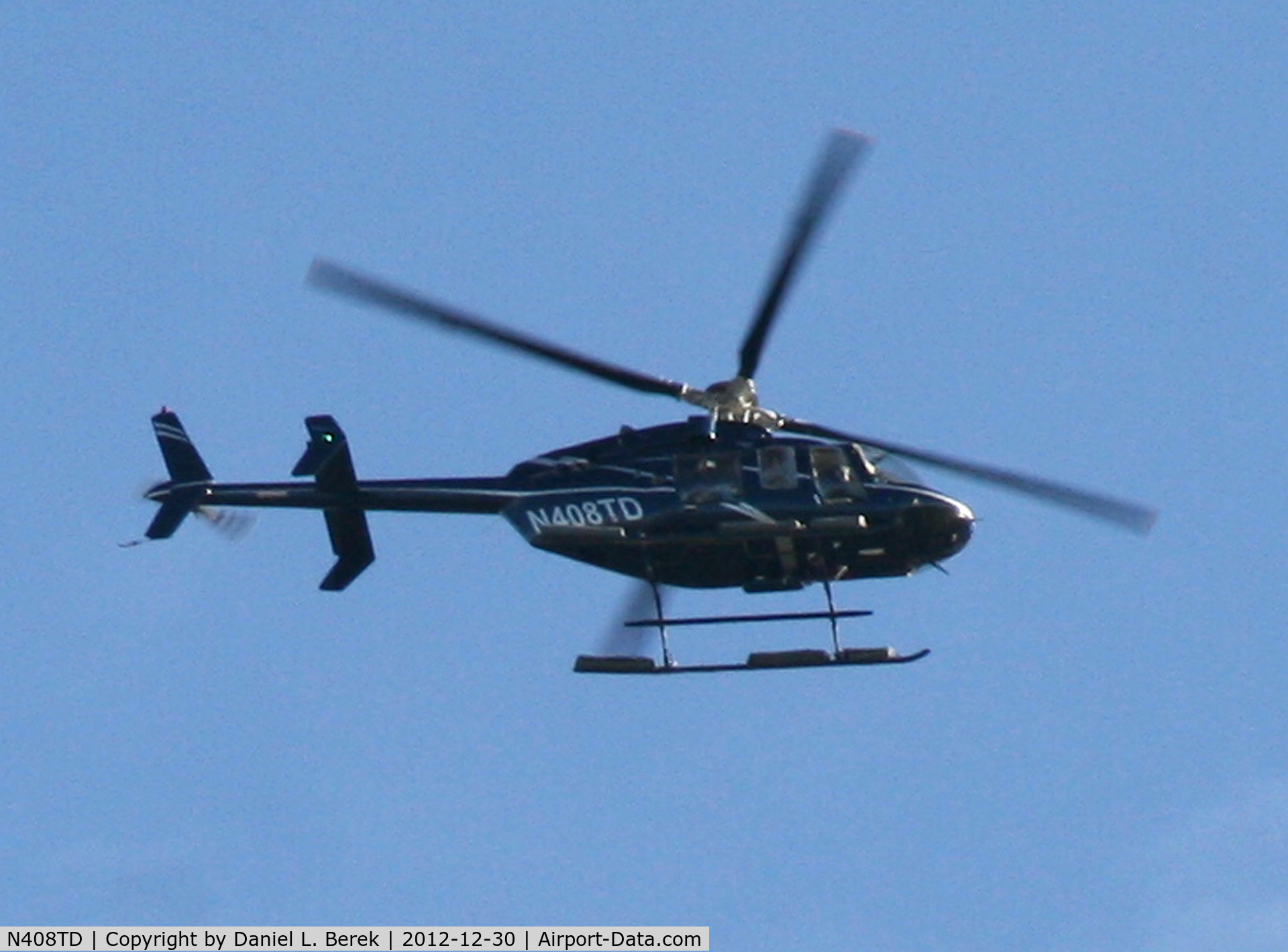 N408TD, 2007 Bell 407 C/N 53771, Hovering over the East River.