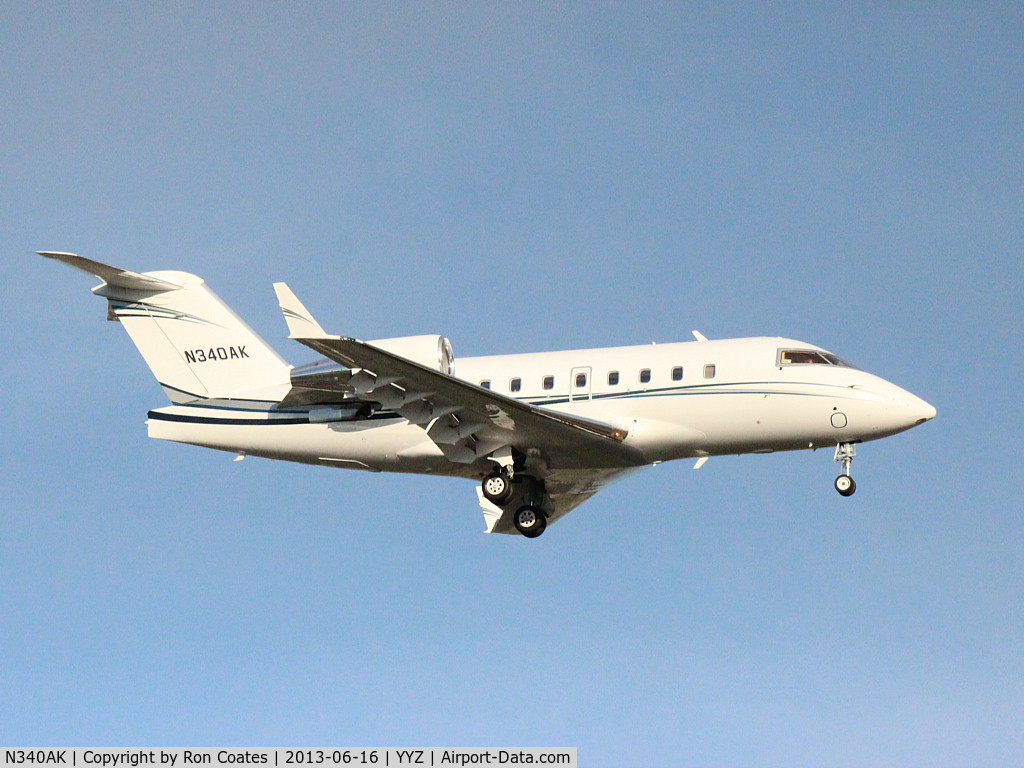 N340AK, 1999 Bombardier Challenger 604 (CL-600-2B16) C/N 5405, 1999 Bombardier CL-600 landing on runway 24L at Toronto Int'l Aiport