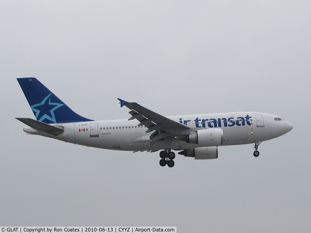 C-GLAT, 1991 Airbus A310-308 C/N 588, This Air Transat Airbus 310-308 prepares to land on runway 23 on a very overcast day at Toronto Int'l Airport (YYZ)