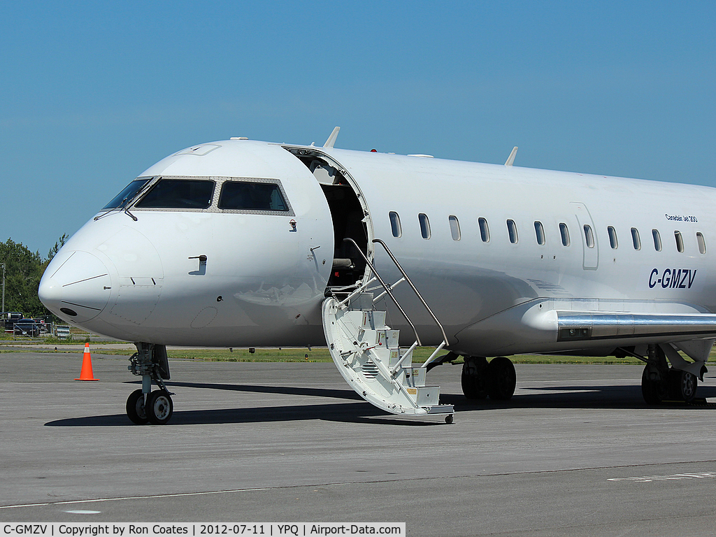 C-GMZV, 2001 Canadair CRJ-200LR (CL-600-2B19) C/N 7494, This 2001 Bombardier	CL-600-2B19 sits outside the offices of 