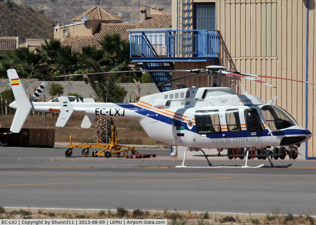 EC-LXJ, 2007 Bell 407 C/N 53795, Parked in front of Inaer hangars @ LEMU Ramp...