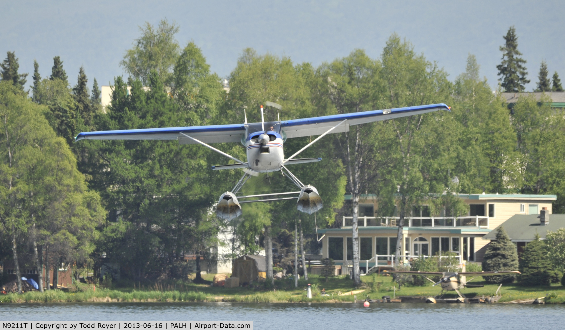 N9211T, 1960 Cessna 180C C/N 50711, Landing at Lake Hood