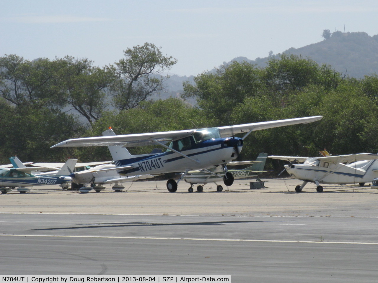 N704UT, 1976 Cessna 150M C/N 15078891, 1976 Cessna 150M, Continental O-200 100 Hp, another takeoff climb Rwy 22