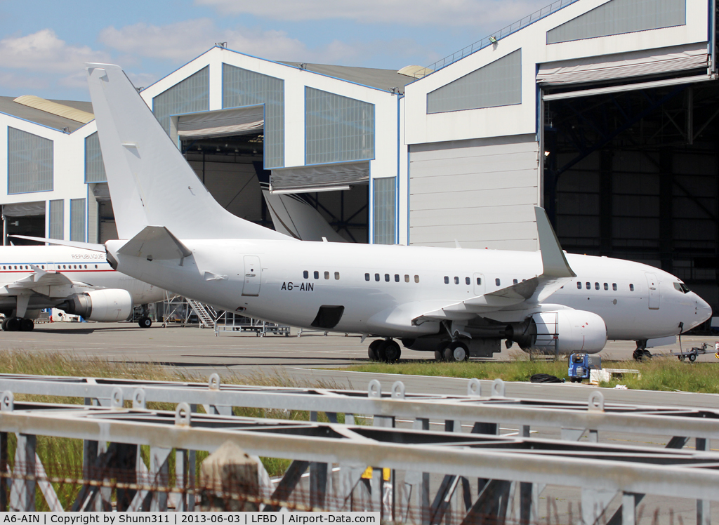 A6-AIN, 1999 Boeing 737-7Z5 BBJ C/N 29268, Parked at Sabena Technics for maintenance... All white c/s...