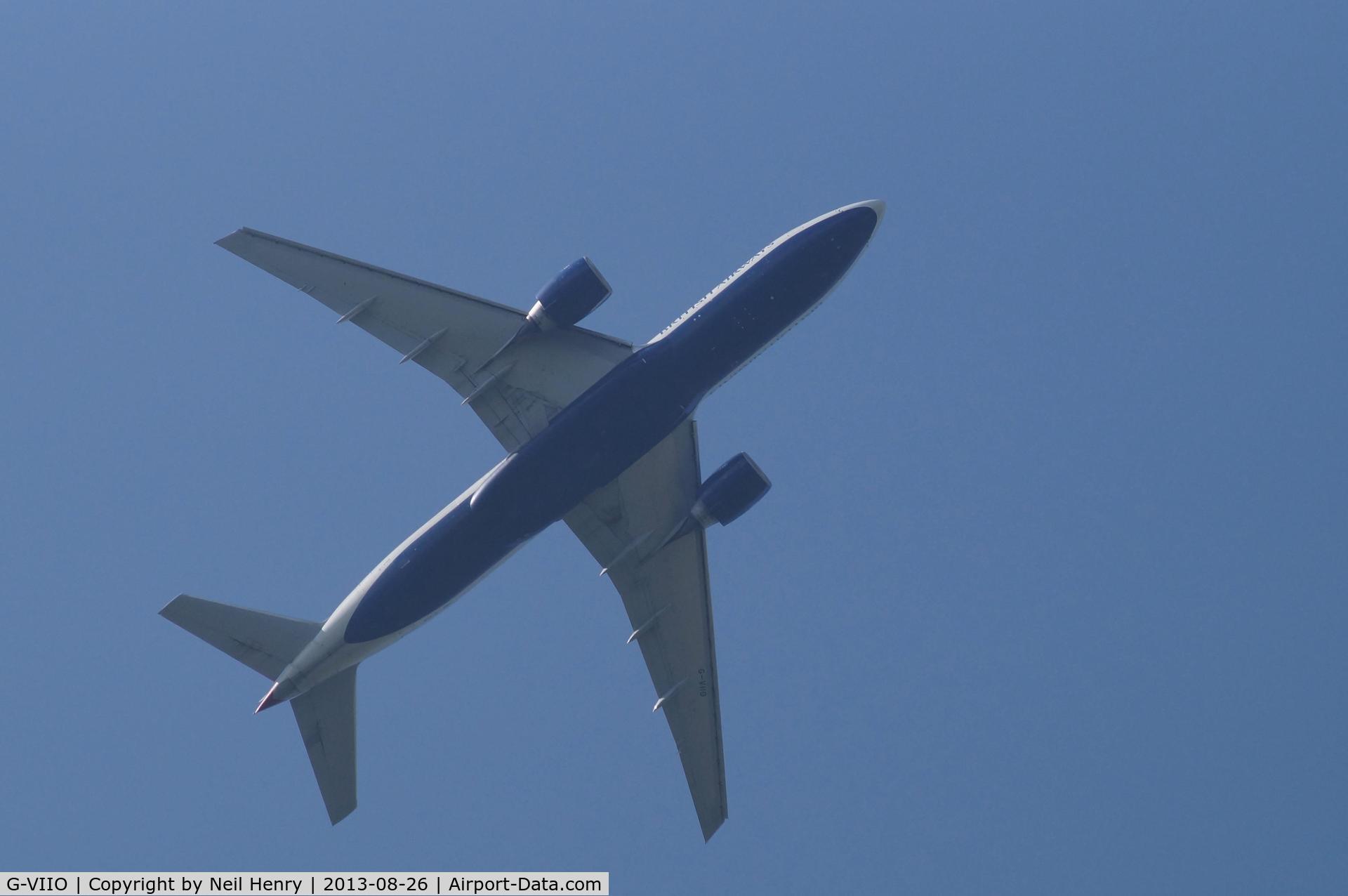 G-VIIO, 1999 Boeing 777-236 C/N 29320, Climbing after take-off eastwards from LGW - over Blindley Heath, Surrey, UK