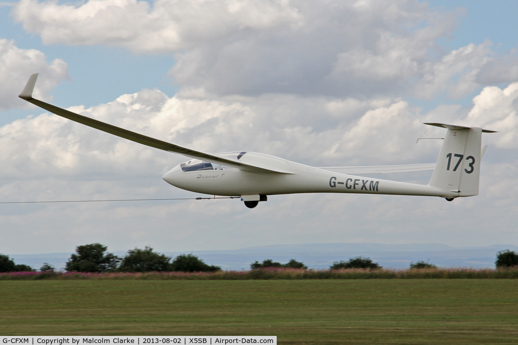 G-CFXM, 1983 Schempp-Hirth Discus bT C/N 16, Schempp-Hirth Discus BT being launched for a cross country flight during The Northern Regional Gliding Competition, Sutton Bank, North Yorks, August 2nd 2013.