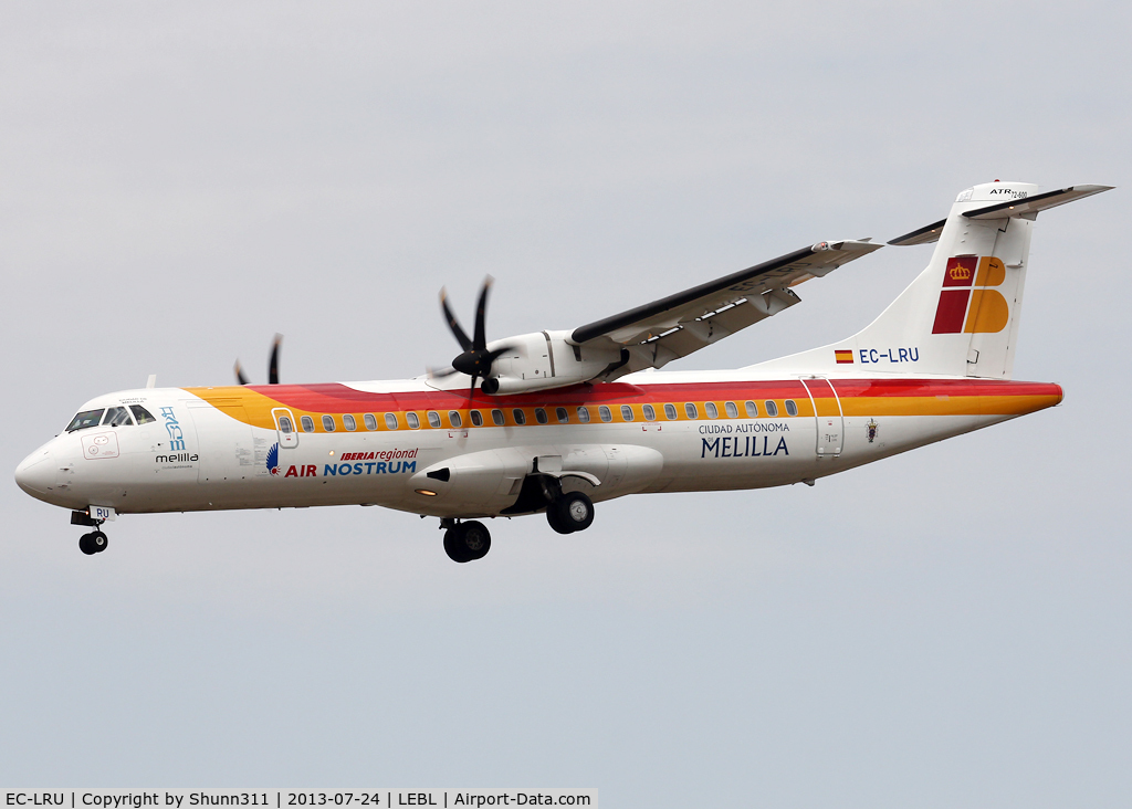 EC-LRU, 2012 ATR 72-600 C/N 1032, Landing rwy 25R with additional promoting 'Ciudad de Melilla' titles