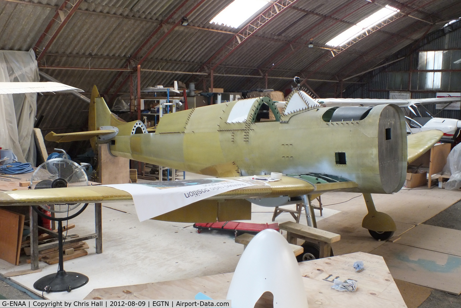 G-ENAA, 2013 Supermarine Aircraft Spitfire Mk.26B C/N LAA 324-15097, 2 seat Supermarine Spitfire MK26B under construction at Enstone Airfield. This is part of the ambitious plan by the Enstone Flying Club to build 12 Spitfire replicas and form a squadron which will display at airshows and events around the country.
