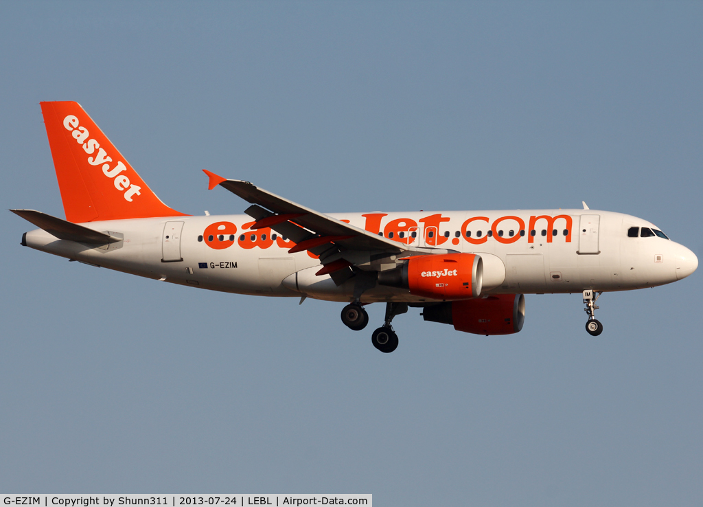G-EZIM, 2005 Airbus A319-111 C/N 2495, Landing rwy 25R with 'Come on, Let's fly' titles removed...