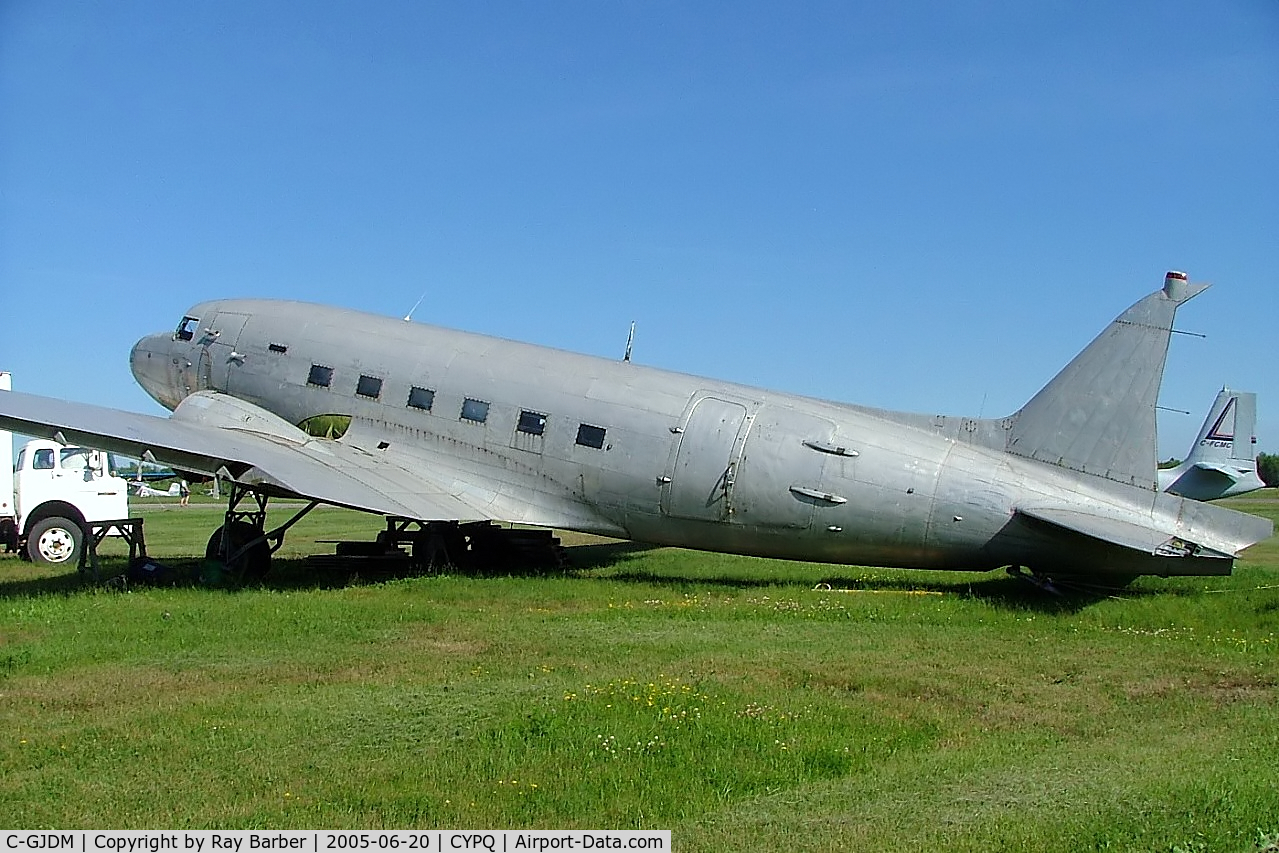 C-GJDM, Douglas C-47B Skytrain C/N 20721, Douglas DC-3C-47B-1-DL [20721] Peterborough~C 20/06/2005. Stored.