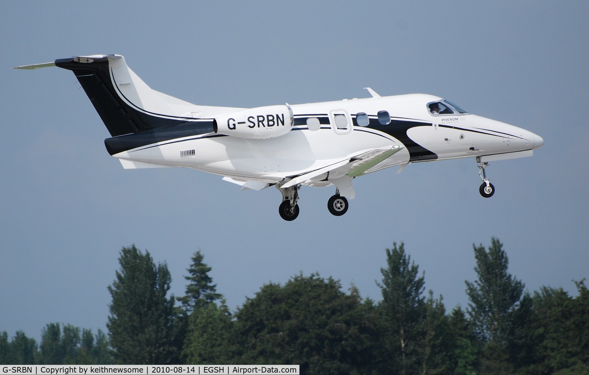 G-SRBN, 2009 Embraer EMB-500 Phenom 100 C/N 50000056, Landing onto runway 09 in good light !