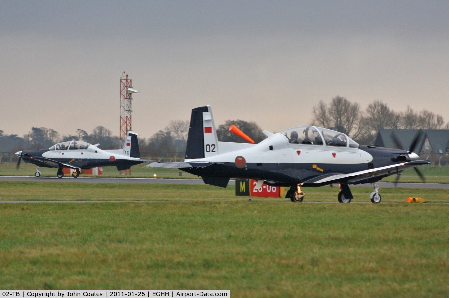 02-TB, 2010 Raytheon T-6C Texan II C/N PM-2, Departing on delivery with 04-TD