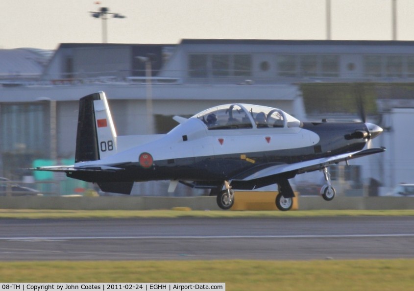 08-TH, 2011 Raytheon T-6C Texan II C/N PM-8, Touching down on delivery flight.