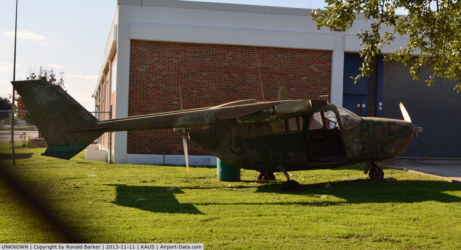 UNKNOWN, Miscellaneous Various C/N unknown, O-2A formerly stationed a Bergstrom AFB, TX, with its wings clipped at John H. Reagan High School, Austin, TX