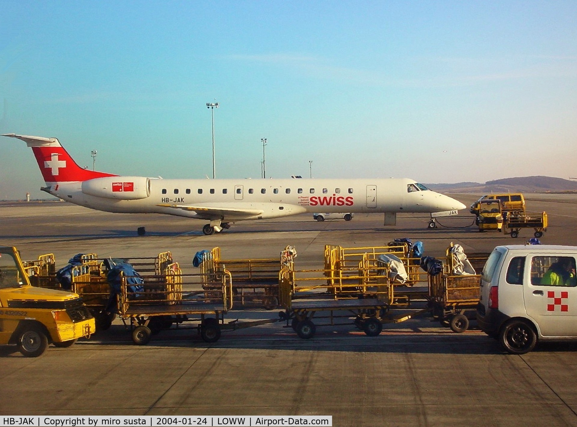 HB-JAK, 2001 Embraer EMB-145LU (ERJ-145LU) C/N 145387, Swiss Airlines Embraer EMB-145LU docked at Vienna-Schwechat International Airport.