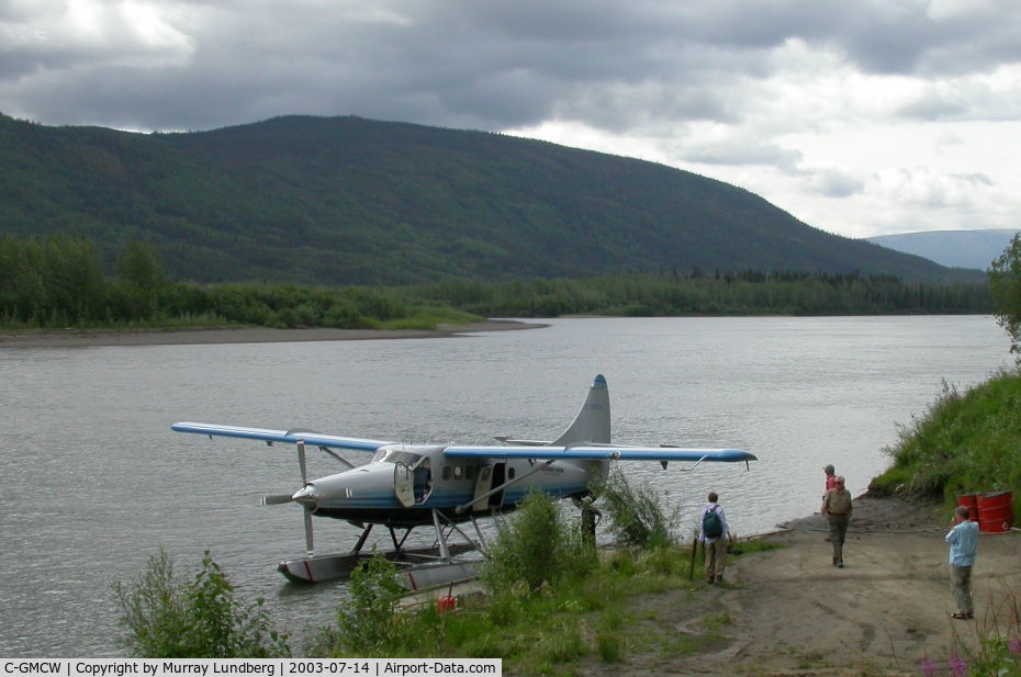C-GMCW, 1956 De Havilland Canada DHC-3 Otter C/N 108, Loading along the Stewart River in the Yukon.