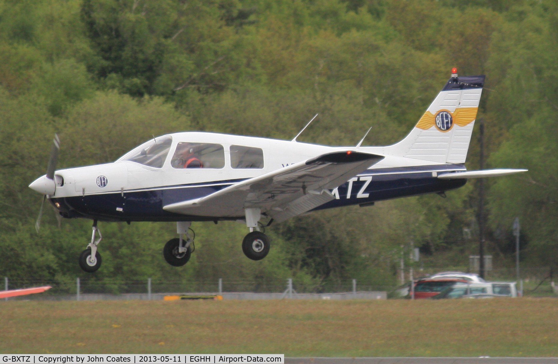 G-BXTZ, 1989 Piper PA-28-161 Cherokee Warrior II C/N 2841181, About to touchdown