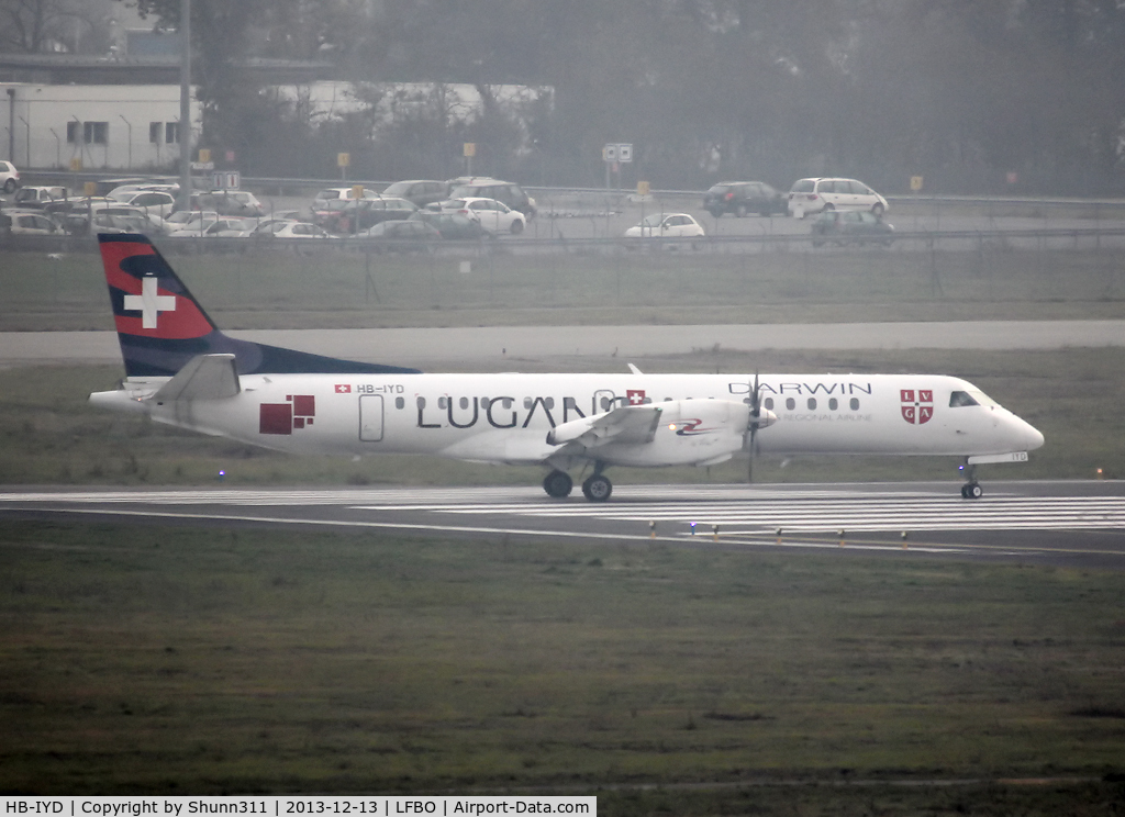 HB-IYD, 1998 Saab 2000 C/N 2000-059, Lining up rwy 14L for departure in special Lugano c/s