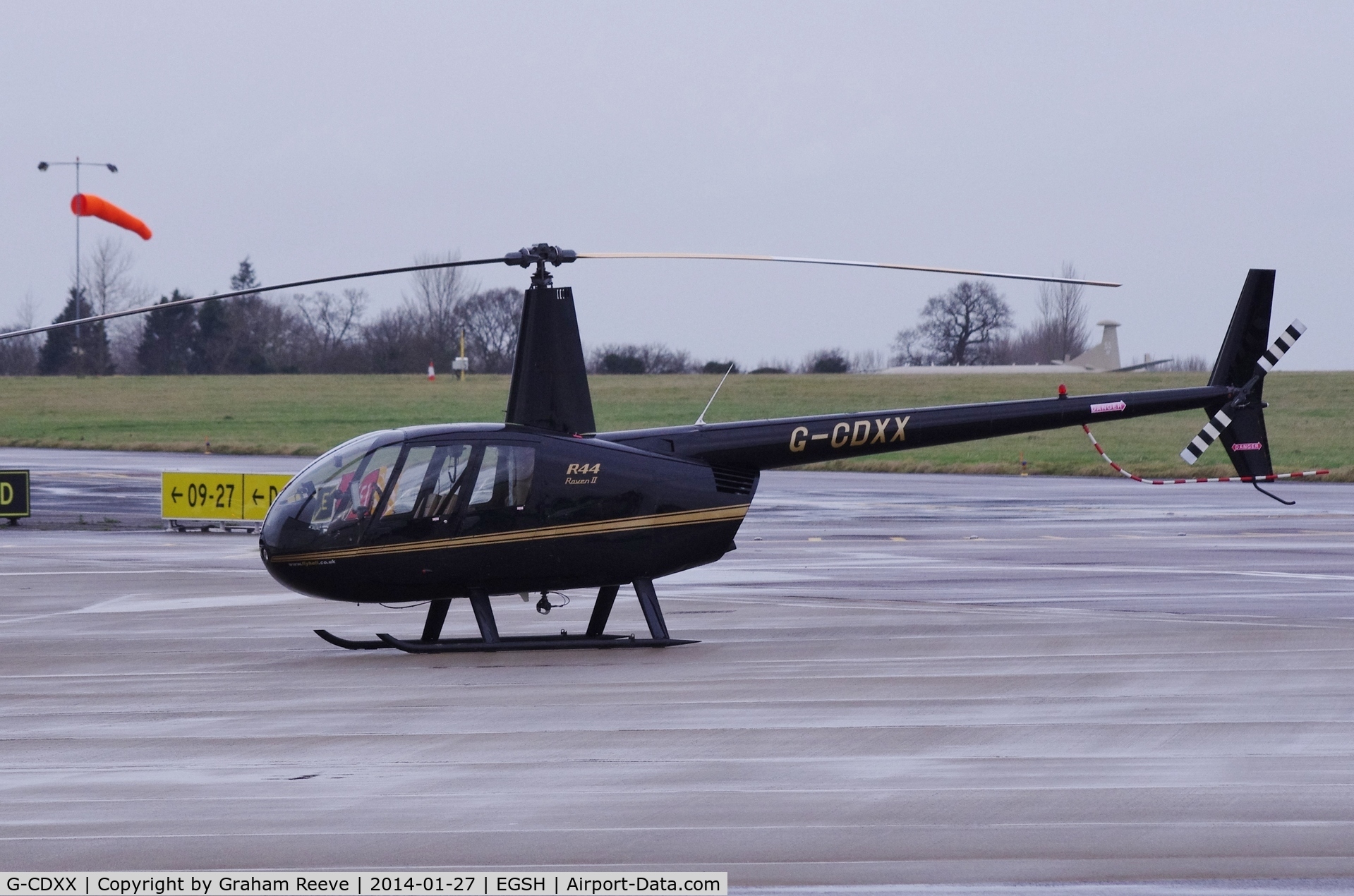 G-CDXX, 2005 Robinson R44 Raven II C/N 10624, Parked at Norwich.