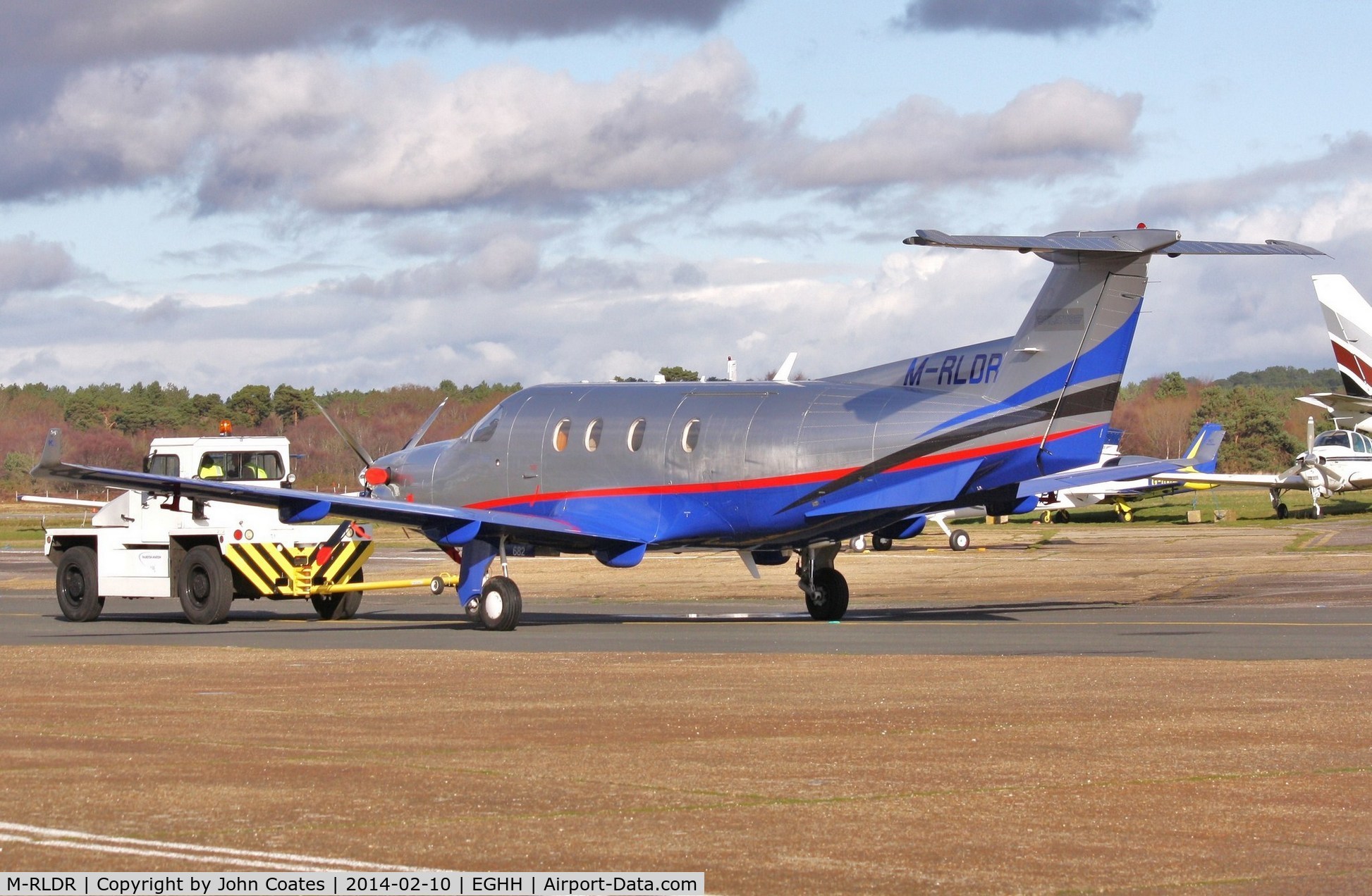 M-RLDR, 2005 Pilatus PC-12/45 C/N 682, Being towed past Airtime North