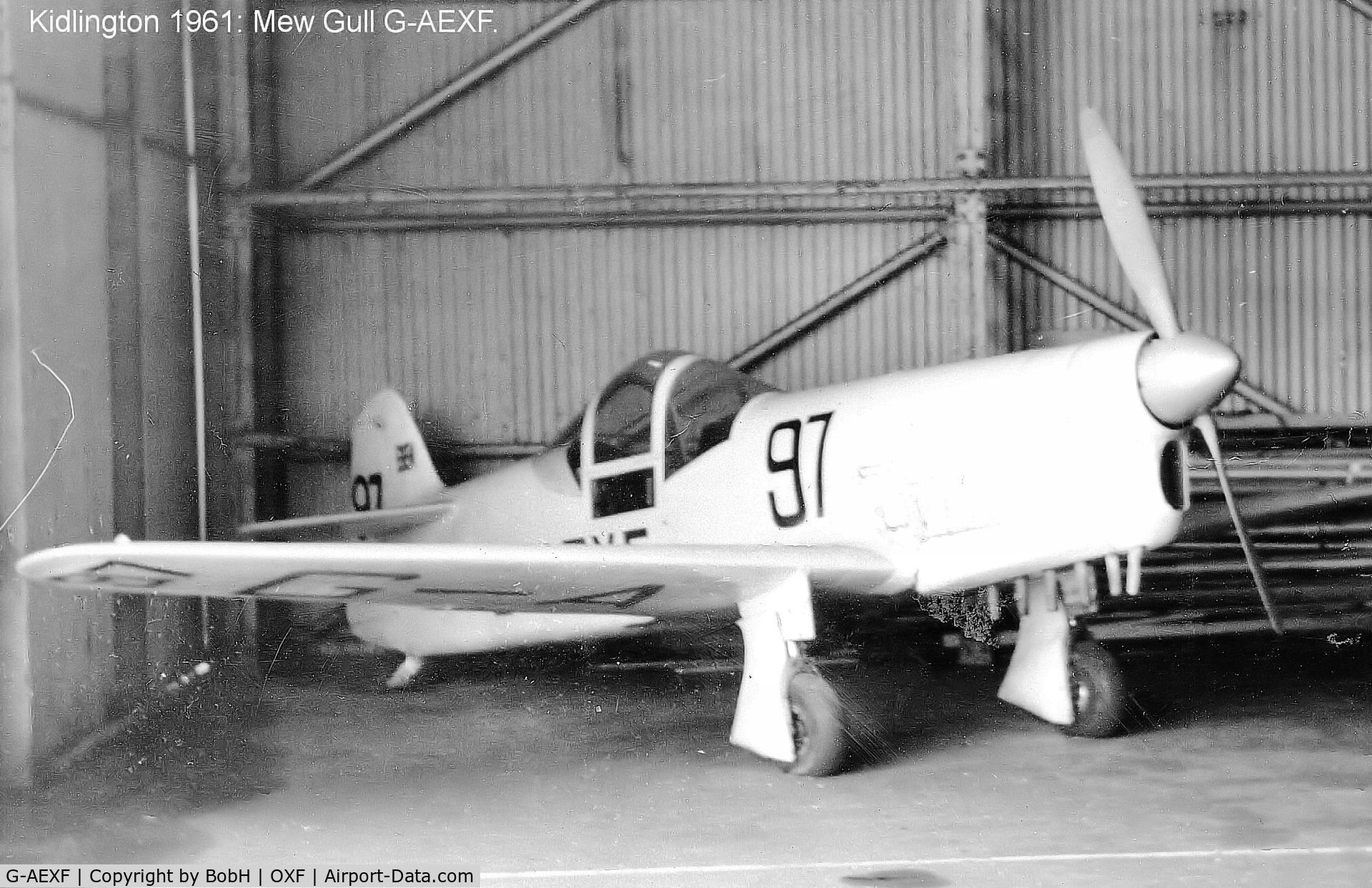 G-AEXF, 1936 Percival E-2H Mew Gull C/N E22, Taken in March 1961 at Kidlington. This was before it's rebuild in 1975. Compare it to the later pictures here and note differences to the wheel spats and the cockpit height (this mod was done for visibility but slowed the aircraft by over 20MPH)