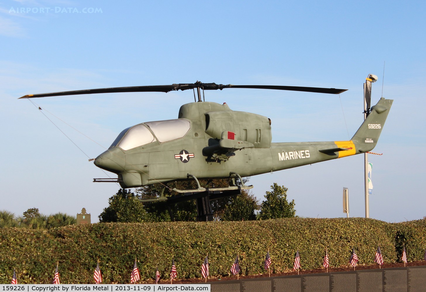 159226, Bell AH-1J Sea Cobra C/N 26066, AH-1J Sea Cobra on a Veterans wall Pensacola FL