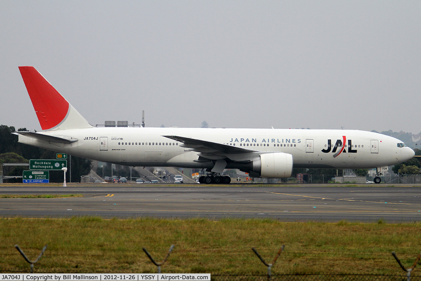 JA704J, 2003 Boeing 777-246/ER C/N 32892, taxi from 34L