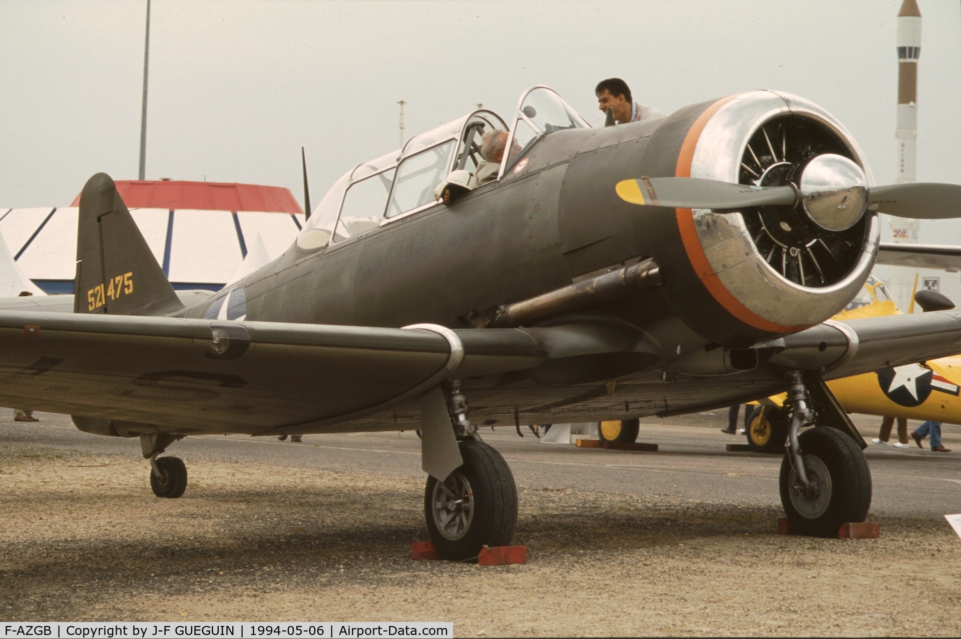 F-AZGB, Canadian Car & Foundry Harvard Mk.4 C/N CCF4-175, On display at Paris-Le Bourget Airport (1er Salon de l'Aviation Ancienne, 1994), ex-RCAF serial 20384 built in 1952, painted with false USAF serial 521475. (note: my next photo was placed here by mistake, it shows F-AZCM at La Ferté-Alais Airshow 2004)