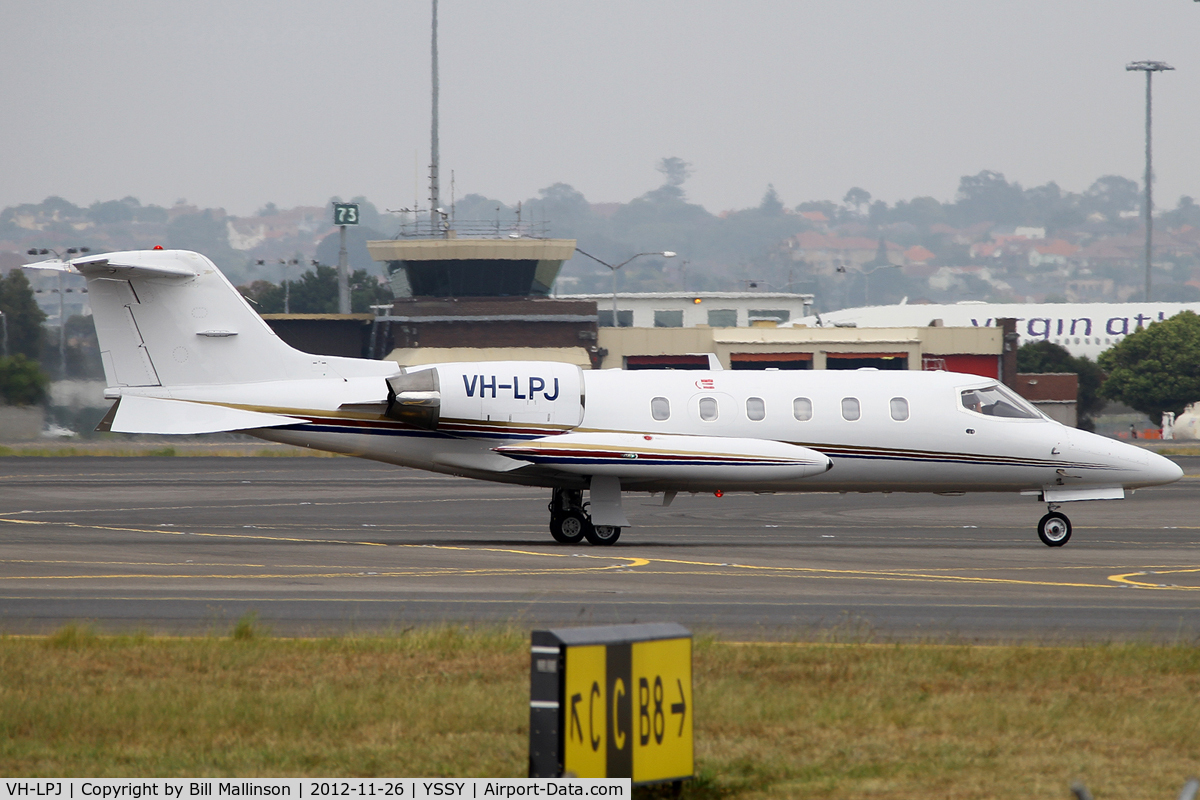 VH-LPJ, 1984 Gates Learjet 35A C/N 593, taxiing from 16L