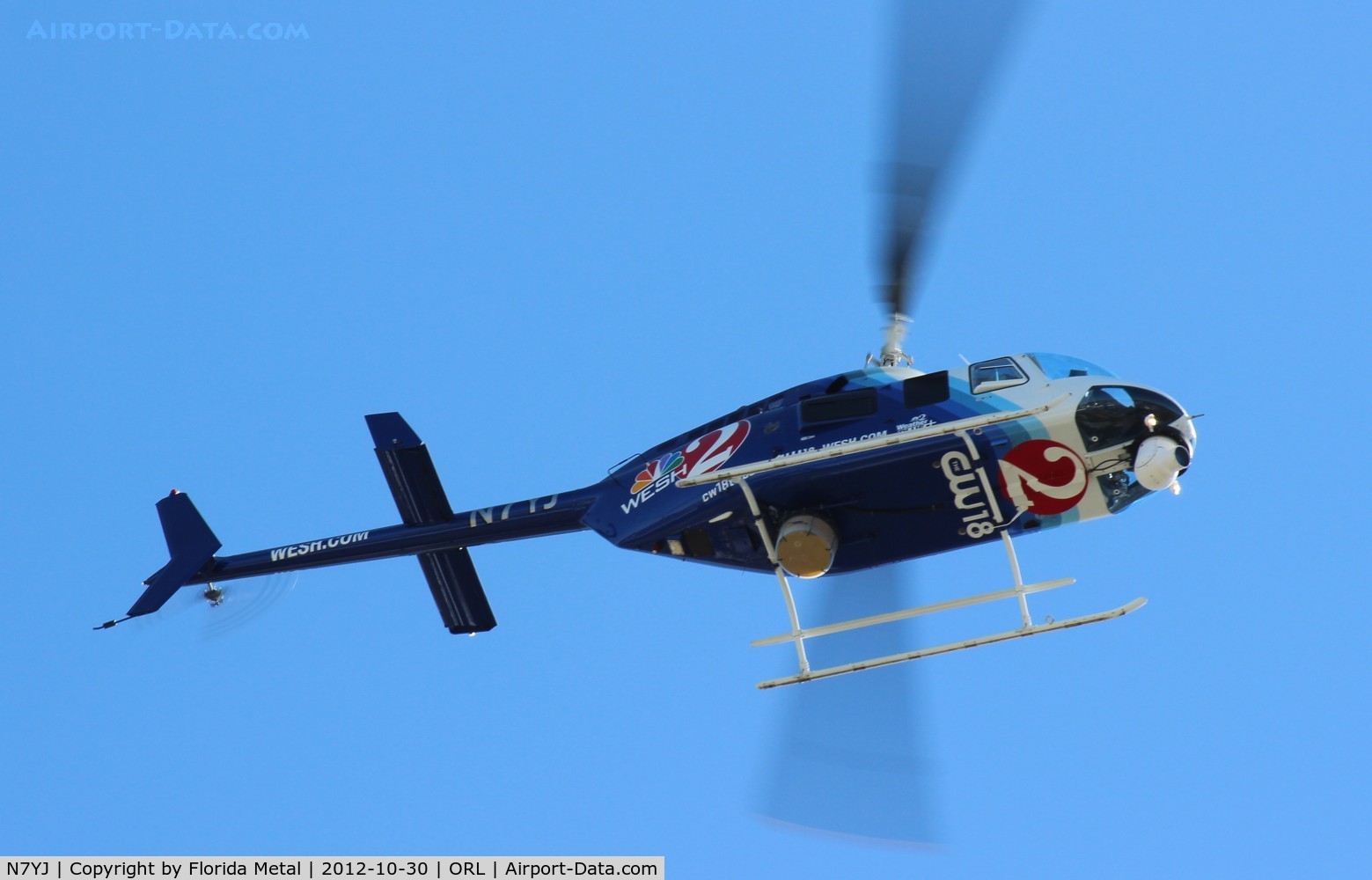 N7YJ, Bell 206L-4 LongRanger IV LongRanger C/N 52026, West 2 News Orlando NBC Affiliate flying over NBAA statics