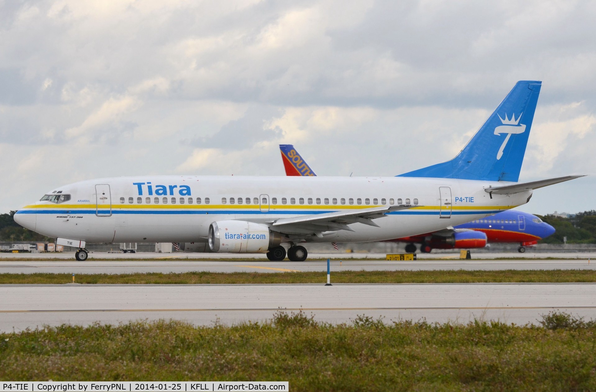P4-TIE, 1988 Boeing 737-322 C/N 24249, Tiara B733 taxying for departure