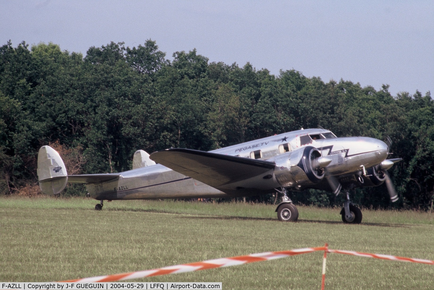 F-AZLL, 1941 Lockheed 12A Electra Junior C/N 1287, Taxiing after landing at La Ferté-Alais, 2004 airshow.