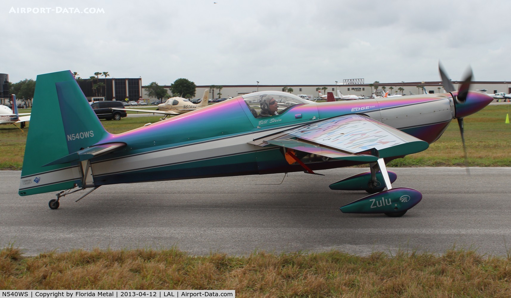 N540WS, 2002 Zivko Edge 540 C/N 0032, Bill Stein Aerosports Edge 540 changes from purple to green as it moves by