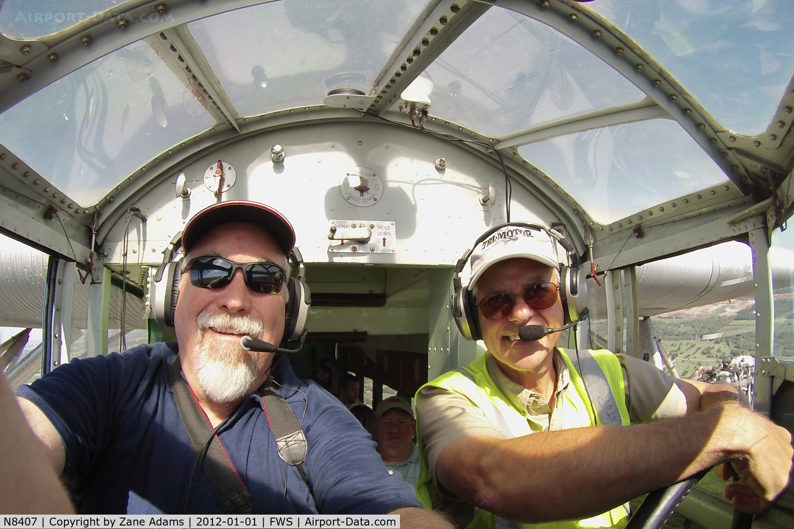 N8407, 1929 Ford 4-AT-E Tri-Motor C/N 69, Larry and I on the flight deck of the EAA Ford Tri-motor over Fort Worth, TX! 
Thanks Chris!