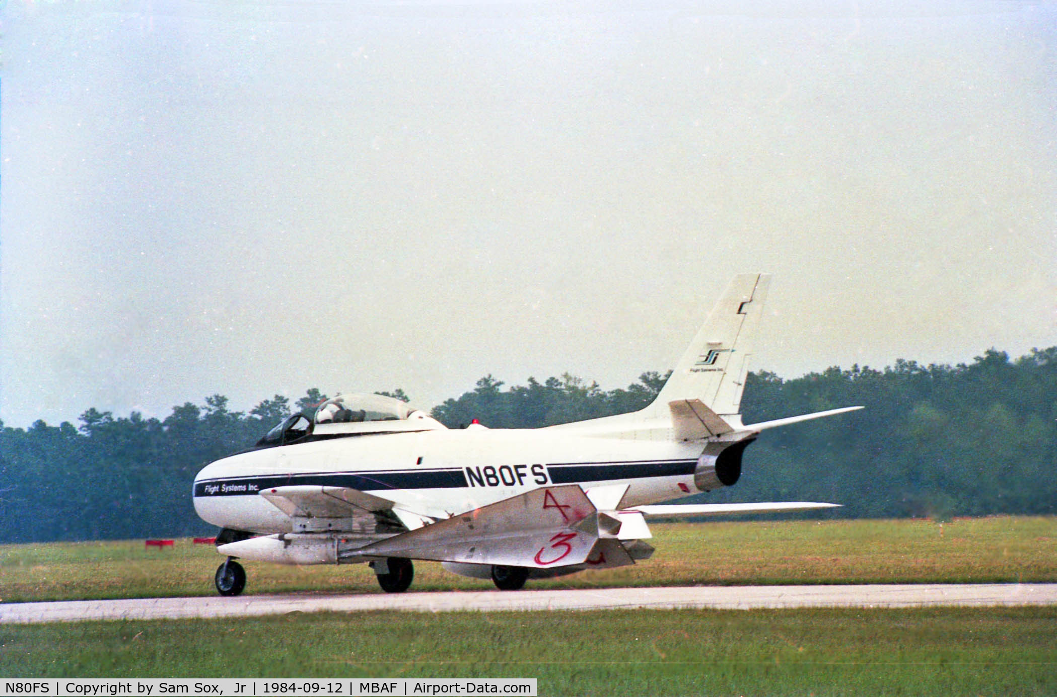 N80FS, 1958 Canadair CL-13B Sabre 6 C/N S6-1675, While visiting MBAFB Myrtle Beach, SC September of 1984, photographed N80FS who was there flying aerial target missions for the 354th FG A-10s  based there at the time.