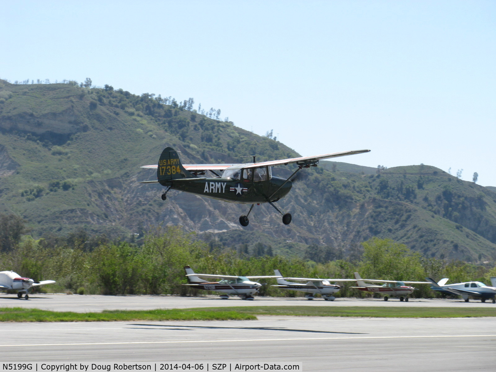 N5199G, 1953 Cessna 305A C/N 22118, 1953 Cessna 305A O-1 BIRD DOG, Continental O-470-11 213 Hp, takeoff climb Rwy 22
