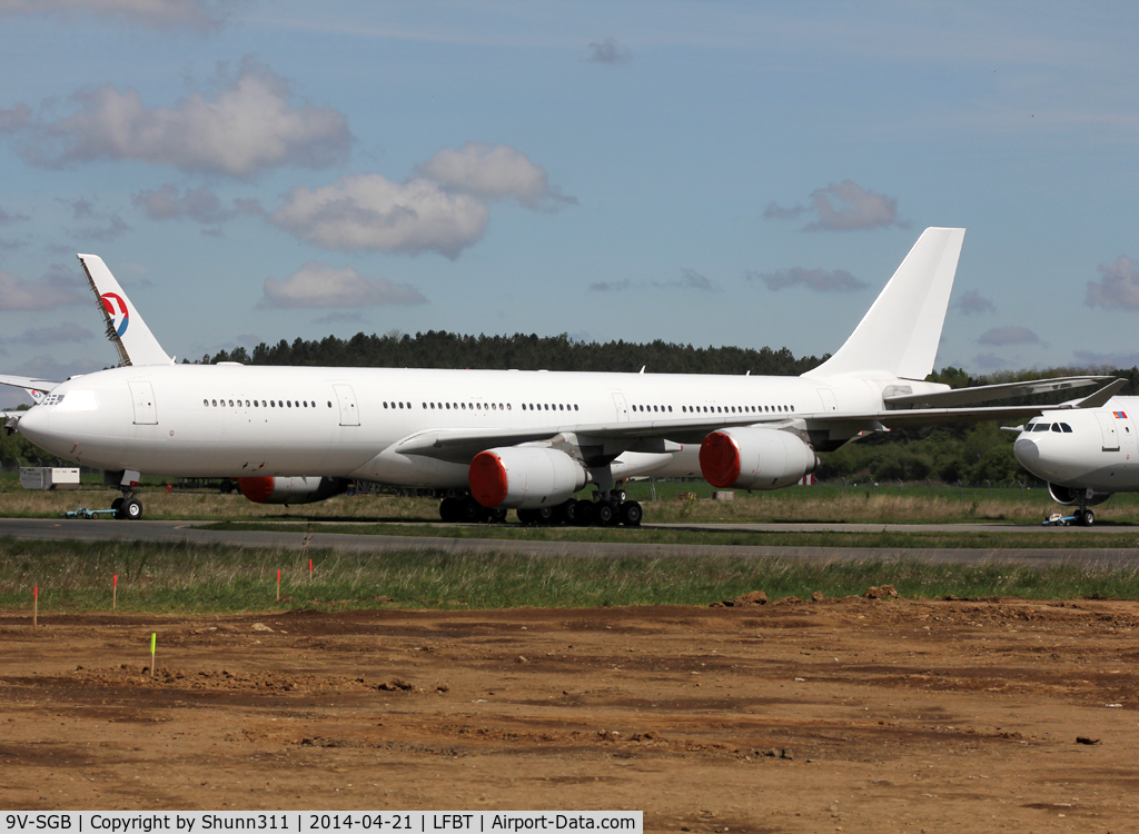 9V-SGB, 2003 Airbus A340-541 C/N 499, Stored in all white c/s without titles... Registration removed...