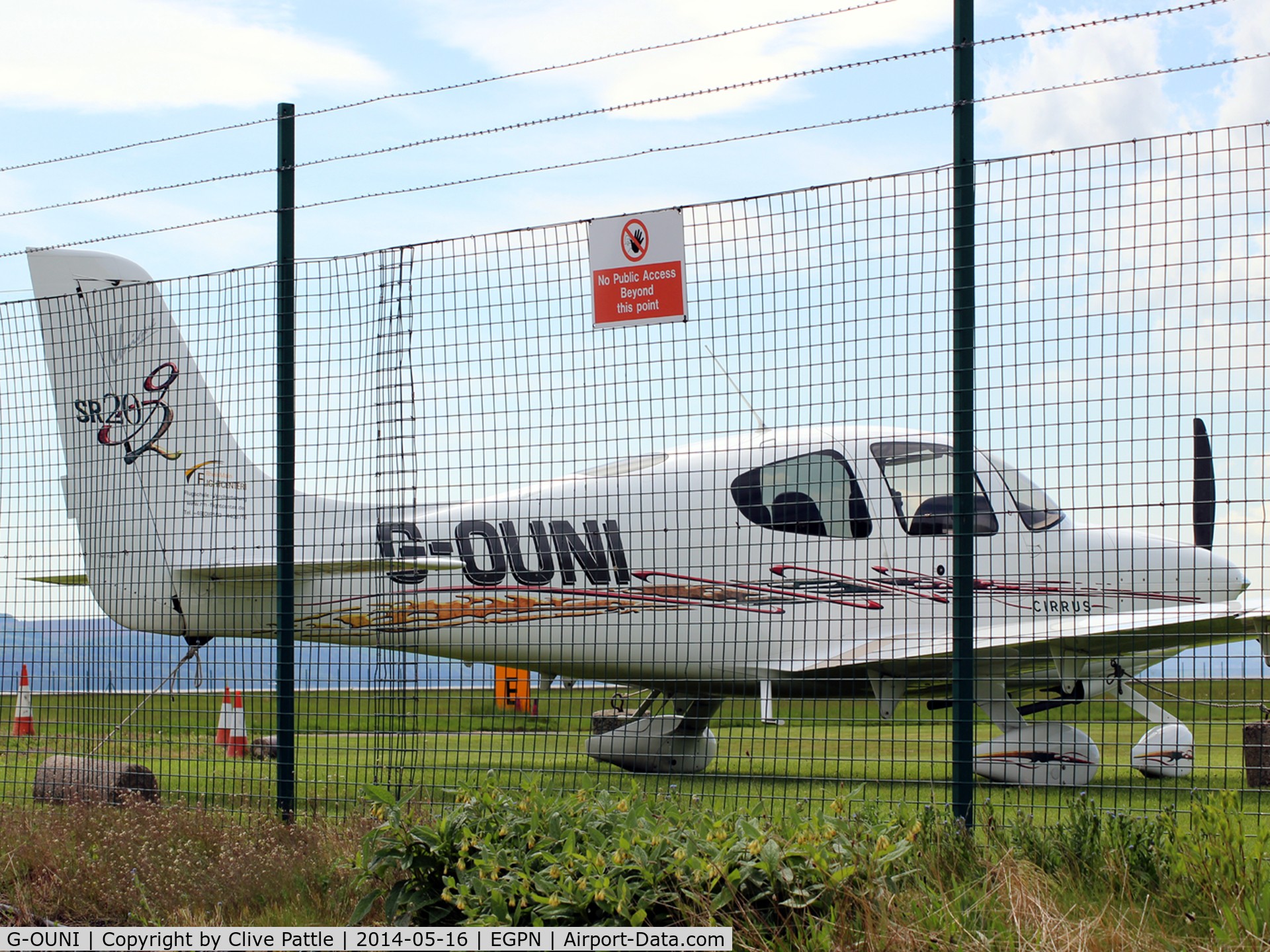 G-OUNI, 2006 Cirrus SR20 G2 C/N 1705, Spotters can get real close without crossng the boundary ....