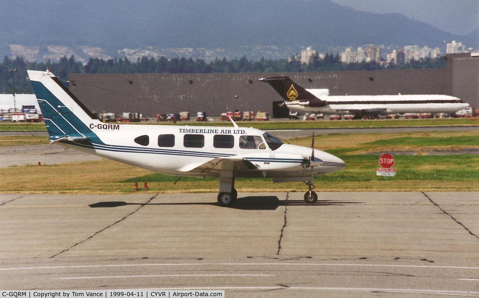 C-GQRM, 1968 Piper PA-31 Navajo C/N 31-158, Timberline Air at CYVR on taxi to the departure runways. Date apprx April 1999.