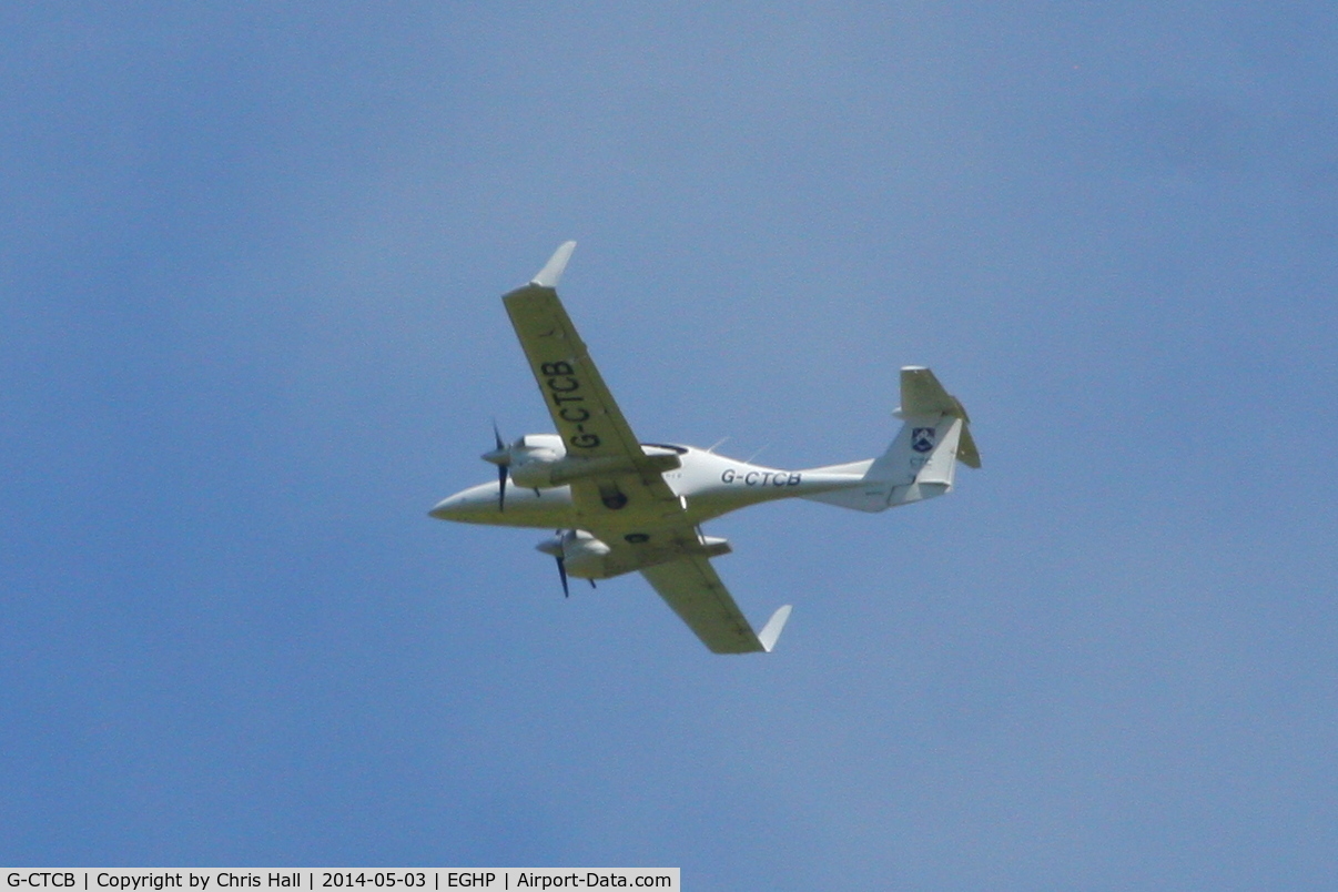 G-CTCB, 2005 Diamond DA-42 Twin Star C/N 42.083, flying over Popham