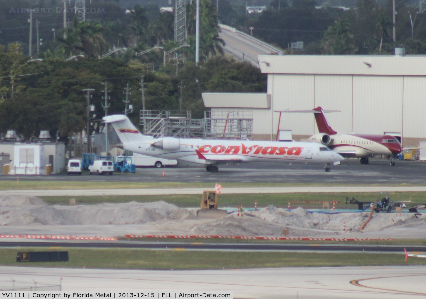 YV1111, Bombardier CRJ-701ER (CL-600-2C10) Regional Jet C/N 10270, Rare in the US, had to shoot bad record shot from across the ramp - Conviasa Venezuela CRJ-700
