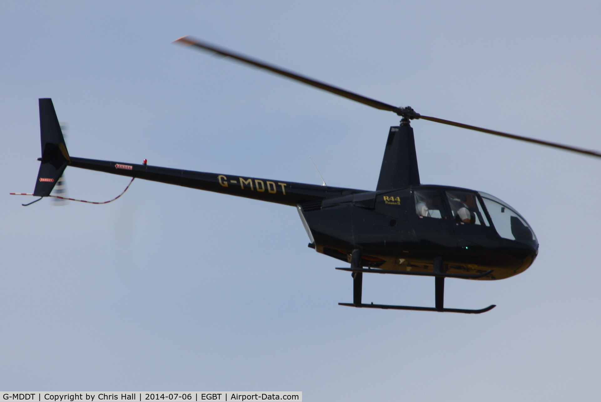 G-MDDT, 2006 Robinson R44 Raven II C/N 11474, being used for ferrying race fans to the British F1 Grand Prix at Silverstone